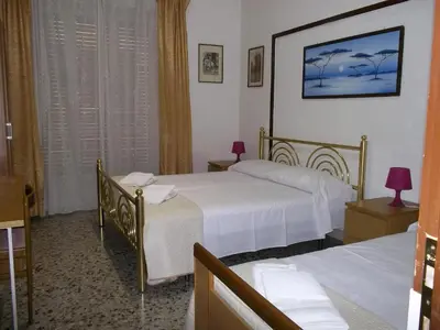 Letto o letti in una camera di Victoria