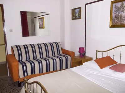 Letto o letti in una camera di Victoria
