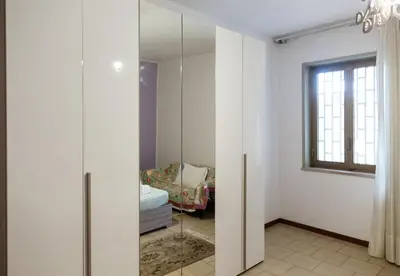 Letto o letti in una camera di Acqua di Mare
