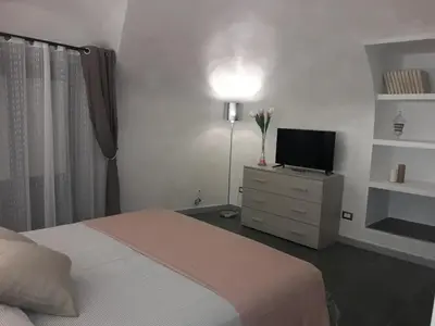 Letto o letti in una camera di Casa Sicilia Acireale