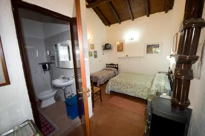 Letto o letti in una camera di Cirasellaetna