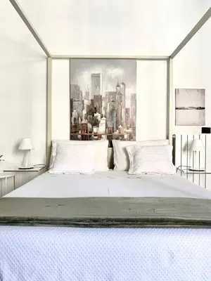 Letto o letti in una camera di Casa del corso