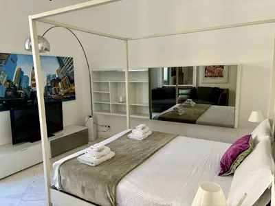 Letto o letti in una camera di Casa del corso