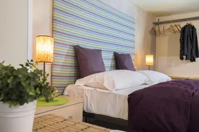 Letto o letti in una camera di RossoCorallo B&B