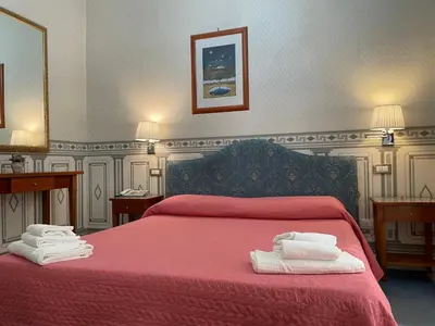 Letto o letti in una camera di City Hall