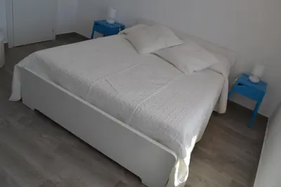 Letto o letti in una camera di Casa Sara
