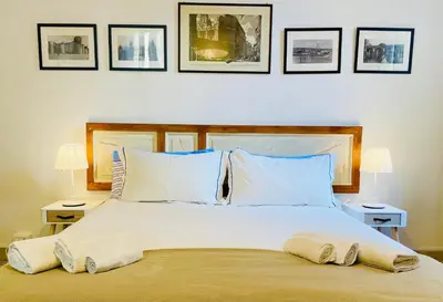 Letto o letti in una camera di Montello Guest House & Apartment