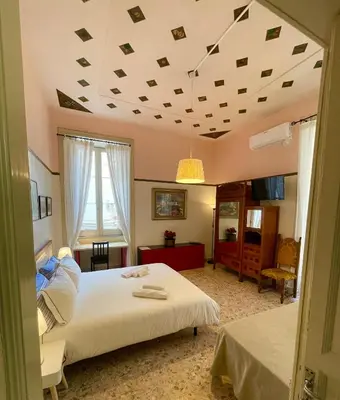 Letto o letti in una camera di Montello Guest House & Apartment
