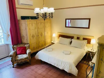 Letto o letti in una camera di Montello Guest House & Apartment
