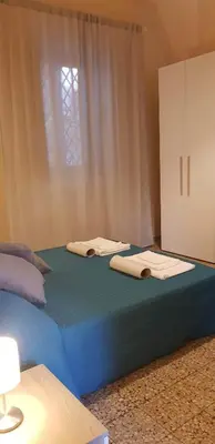 Letto o letti in una camera di Casa Antonella