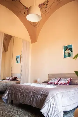 Letto o letti in una camera di Casa Antonella
