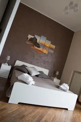 Letto o letti in una camera di Antico Mercato