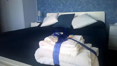 Letto o letti in una camera di Antico Mercato