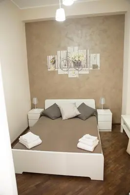 Letto o letti in una camera di Antico Mercato