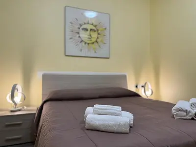 Letto o letti in una camera di Seaside&City