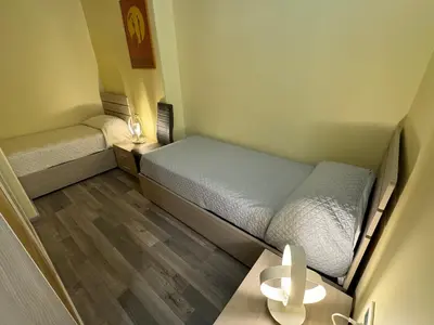 Letto o letti in una camera di Seaside&City