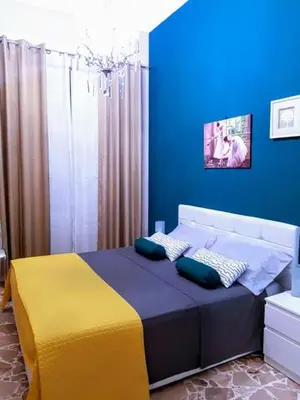 Letto o letti in una camera di Corte Degli Aranci House