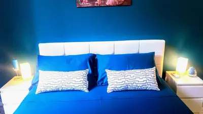 Letto o letti in una camera di Corte Degli Aranci House