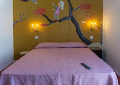 Letto o letti in una camera di Kartè