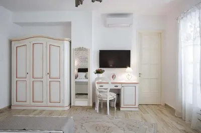 TV o dispositivi per l'intrattenimento presso B&B Blanc Maison Etna Relais & Charme