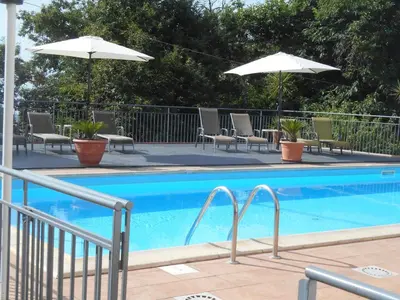 Piscina di Al Villino Sunset appartamento in villa con piscina o nelle vicinanze