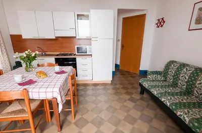 Cucina o angolo cottura di Al Villino Sunset appartamento in villa con piscina