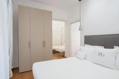 Letto o letti in una camera di RG7 Apartments