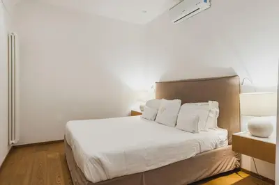 Letto o letti in una camera di RG7 Apartments
