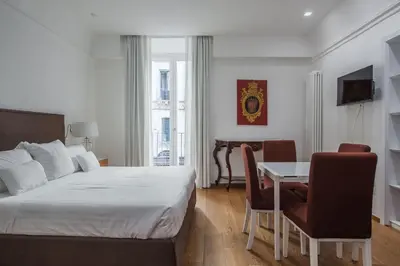Letto o letti in una camera di RG7 Apartments