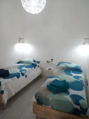 Letto o letti in una camera di Sogno Barocco