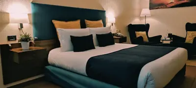 Letto o letti in una camera di Corsaro Etna Hotel&SPA