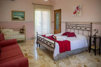 Letto o letti in una camera di Casa vacanze Gioia