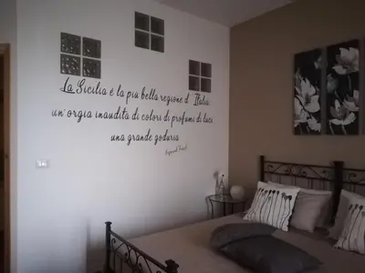 Letto o letti in una camera di Etnante