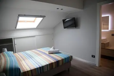 Letto o letti in una camera di Etna Sunrise b&b