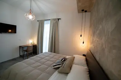 Letto o letti in una camera di Anna & Alfredo bed and breakfast