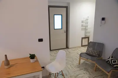 Area soggiorno di UP&B Rooms Catania
