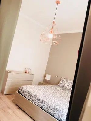 Letto o letti in una camera di SL Apartament San Gregorio