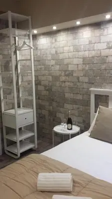 Letto o letti in una camera di VENTIMIGLIA SUITE & WINE