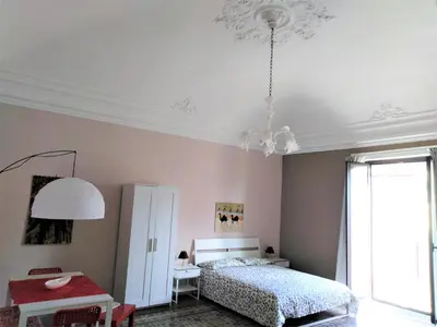 Letto o letti in una camera di Manzoni Suite Home