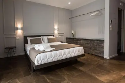 Letto o letti in una camera di Plebis - B&B in Sicilia nel centro storico di Catania