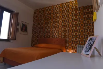 Letto o letti in una camera di Palazzo Galifi