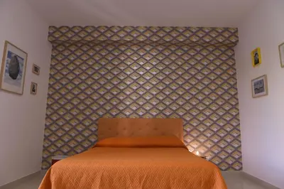 Letto o letti in una camera di Palazzo Galifi