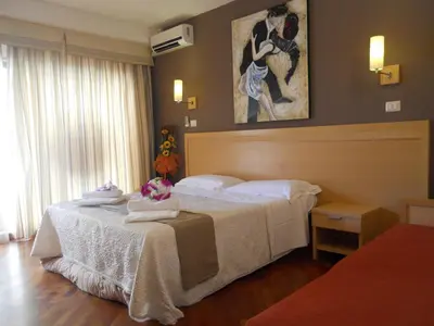 Letto o letti in una camera di Catania Crossing B&B - Rooms & Comforts