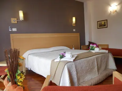Letto o letti in una camera di Catania Crossing B&B - Rooms & Comforts