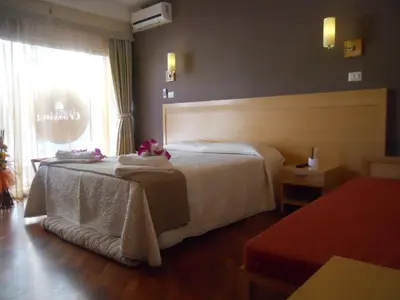 Letto o letti in una camera di Catania Crossing B&B - Rooms & Comforts