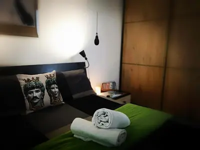 Letto o letti in una camera di La Dimora del Principe - Appartamento