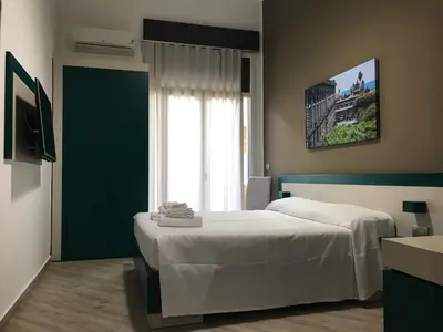 Letto o letti in una camera di Guesthouse Ughetti 21