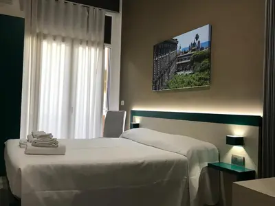 Letto o letti in una camera di Guesthouse Ughetti 21