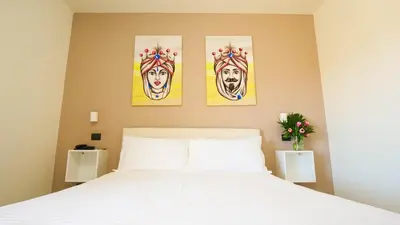 Letto o letti in una camera di 4 SPA Hotel