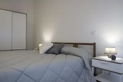 Letto o letti in una camera di TalialETNA Apartments